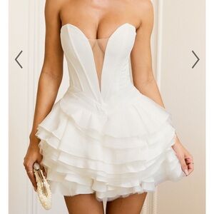 Dry cleaned mini ShowPo after party wedding dress.